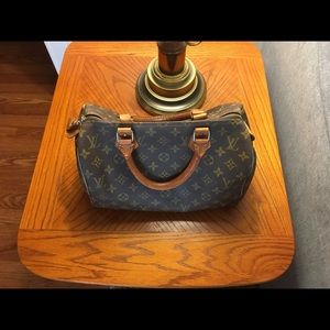 Authentic Speedy Louis Vuitton bag.